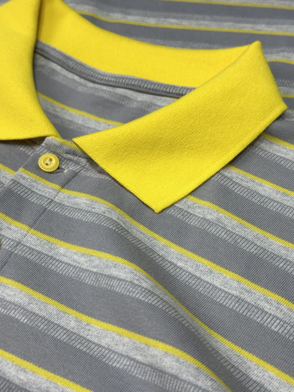 Grey and yellow striped knit collar and cuff development reference